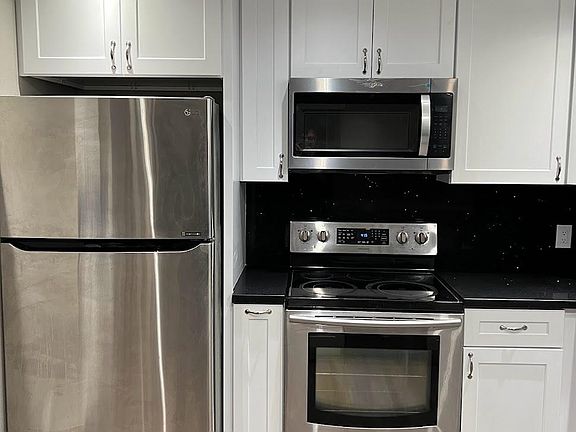 5th image of 6815 Remmet Ave Unit 211
