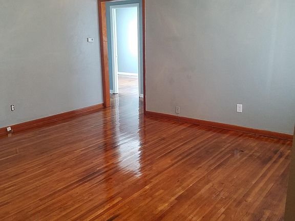 Living room looking into hallway towards bedrooms