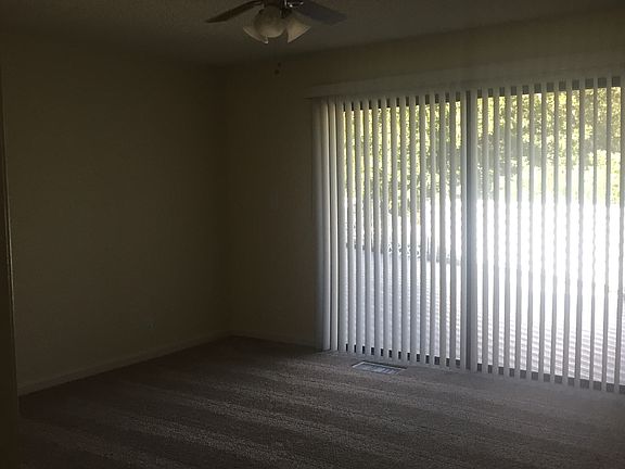 Large master bedroom with beautiful views of the pond