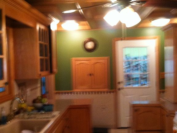 Notice the oak tray ceiling