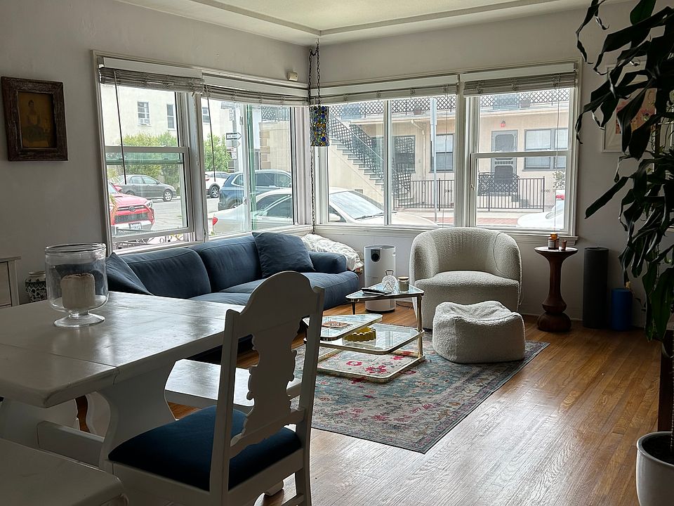 Large living space to the left of entry with lots of light/exposure (photo was taken on overcast day but it's typically bright). Worth looking!