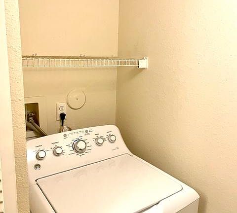 Washer and dryer inside the unit
