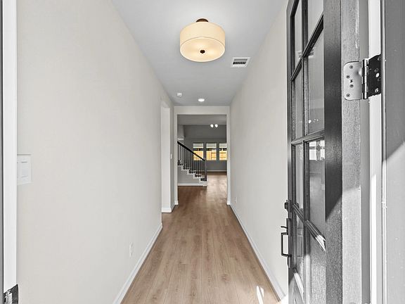 Welcome home! Step inside through the inviting entryway that seamlessly flows into the open-concept