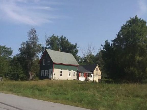 View from road with field. 