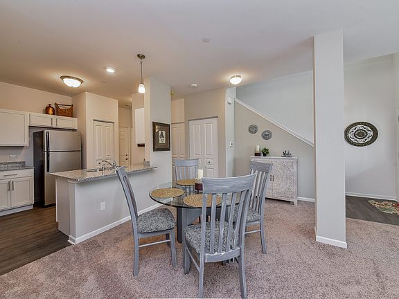 Open concept kitchen, family room, and dining area.