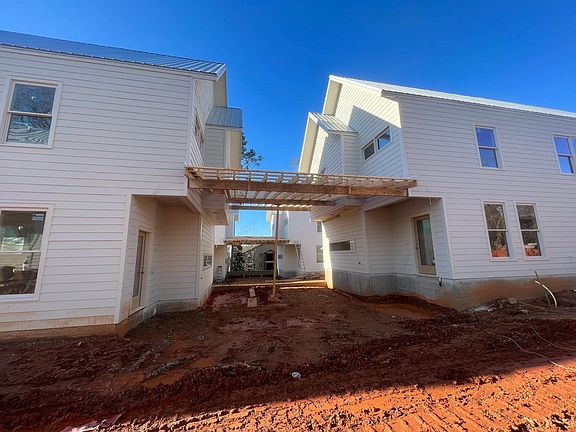 Another angle of the common areas between the houses and a bit of where the driveway will pass through.