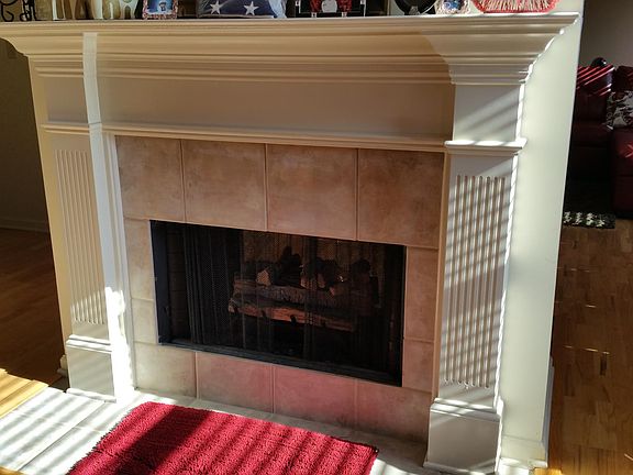 Double-sided fireplace with gas logs