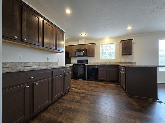 3rd image of 7204 E Grand River Ave Lot 124