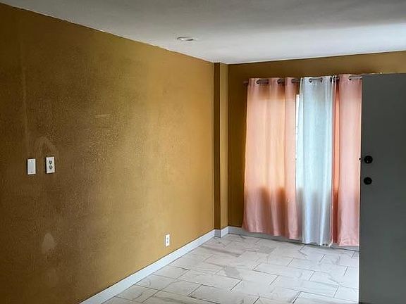 3rd image of 1150 E 80th St #1150