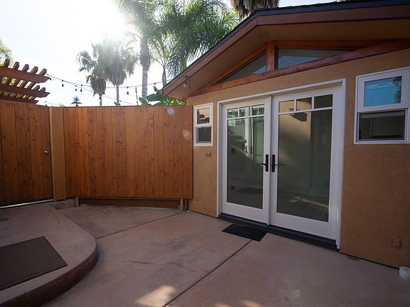 Back patio walks out to laundry room and office area