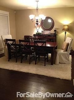 Formal Dining Area
						:
						This area has hardwood floors to enhance your dining furniture.