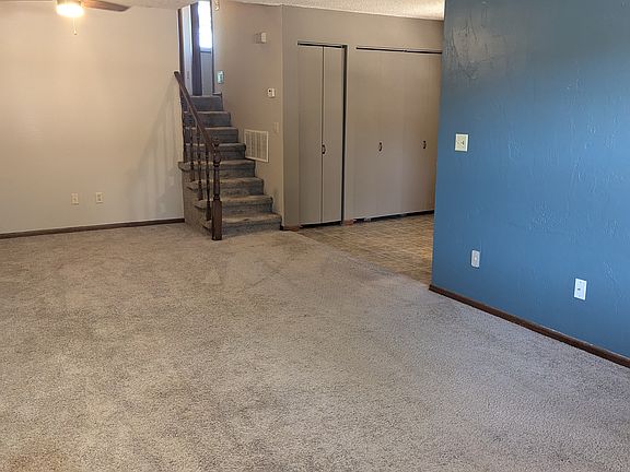 Living room looking to the bedrooms and dining room