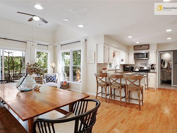 Light, bright and open with enough space to host a crowd.  Step out to Trex decks, or back to updated 1/2 bath and laundry.