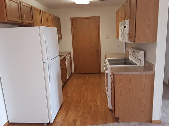 Kitchen with door leading to laundry room