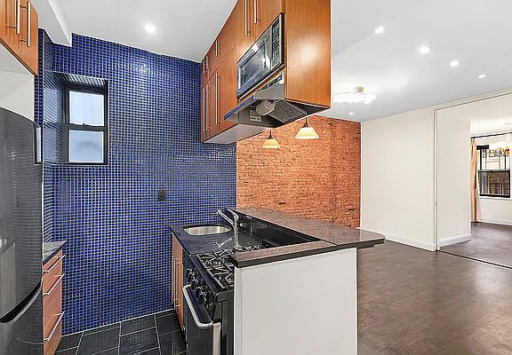 3rd image of 133 E 30th St APT 2A