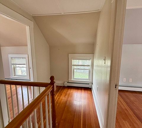 Upstairs landing with area for vanity, reading nook, additional storage, etc.