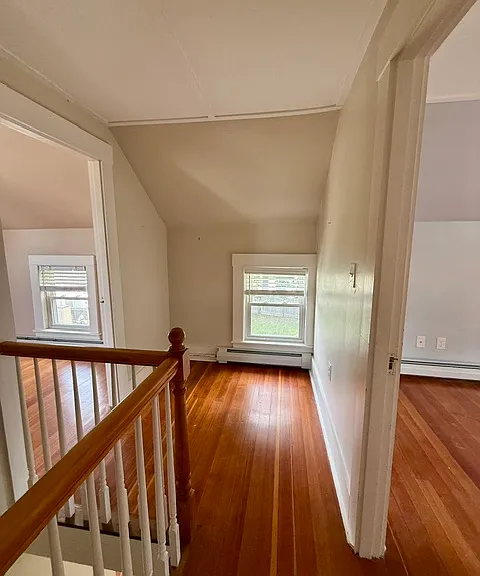 Upstairs landing with area for vanity, reading nook, additional storage, etc.