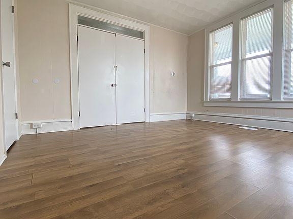 Master bedroom with lots of light from windows