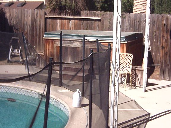 CAL SPA 6 PERSON FENCED POOL