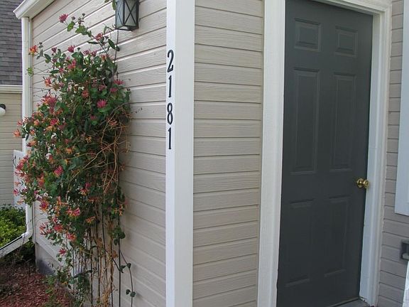 Large locking storage shed adjacent to 2 dedicated parking s
