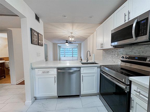 5th image of 9450 Poinciana Place #311
