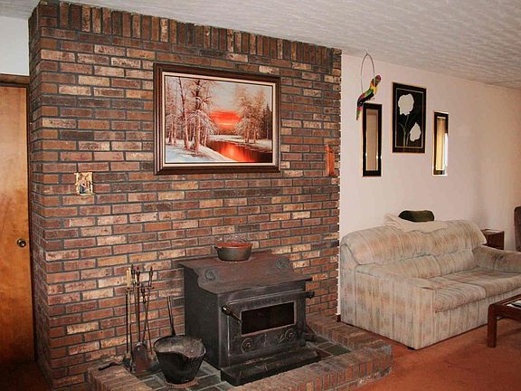 Family room  This is one of two wood stoves you can cozy up to on a winter day