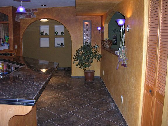 Kitchen cafe area w/waterfall built into wall