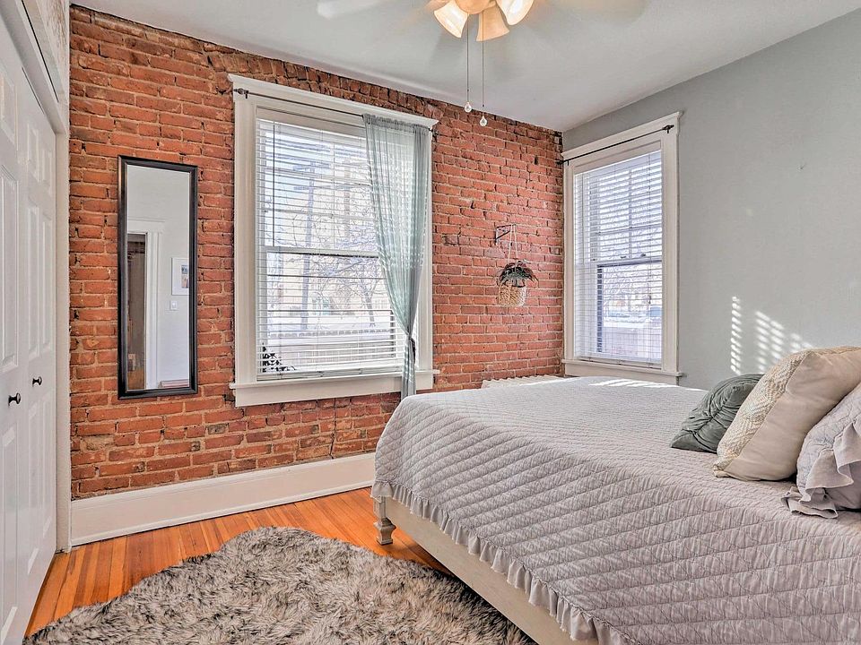 Original brick wall, south facing with lots of light.