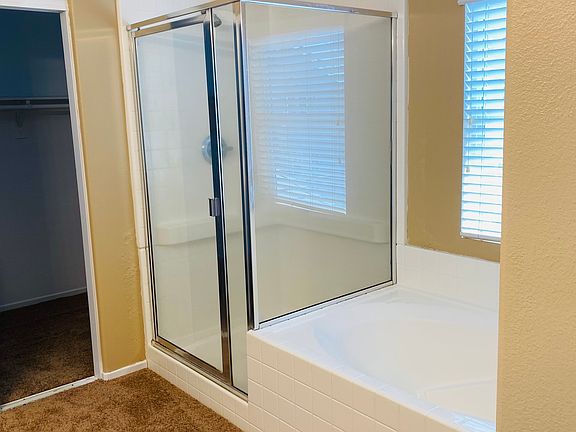 Master bedroom with large well lite closet