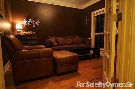 Formal Living Room could be office space
						:
						French doors open to a cozy living area. Professionally tinted windows.