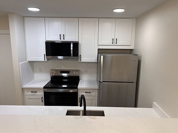 Includes all stainless appliances including microwave, dishwasher, garbage disposal, stove and refrigerator.