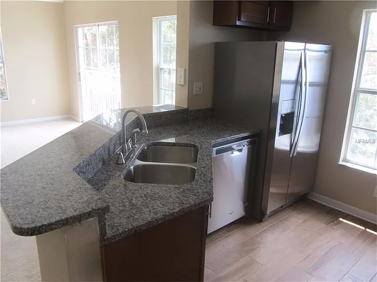 9020 Lake Chase Island Way — Photo 8