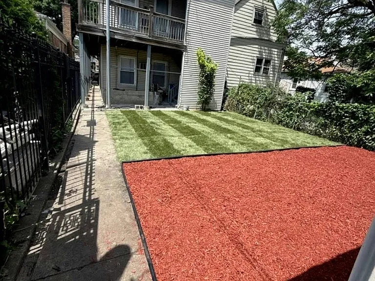 Deck + Backyard with sod and mulch