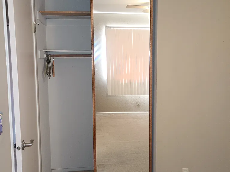 Mirror closet doors in second bedroom