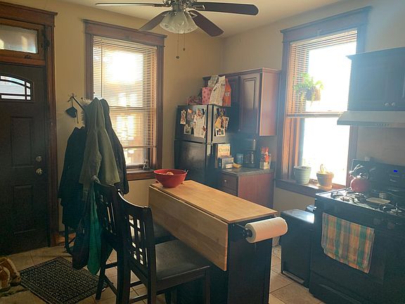 back door leads to small patio and backyard space and well as garage