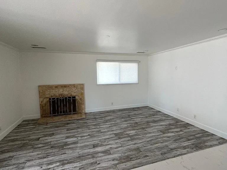 Living room w/ Fireplace.