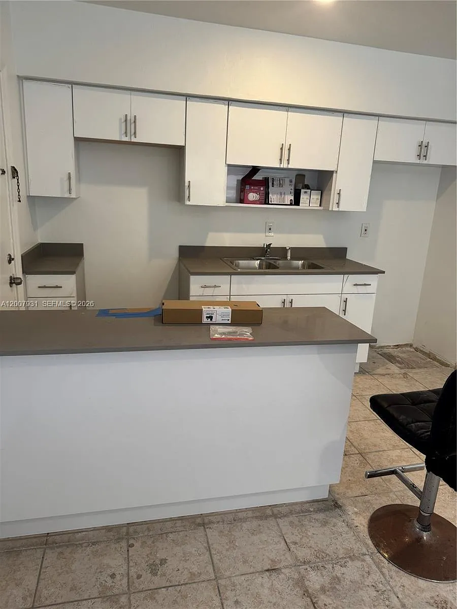Building Photo - 7300 Harding Ave #21
