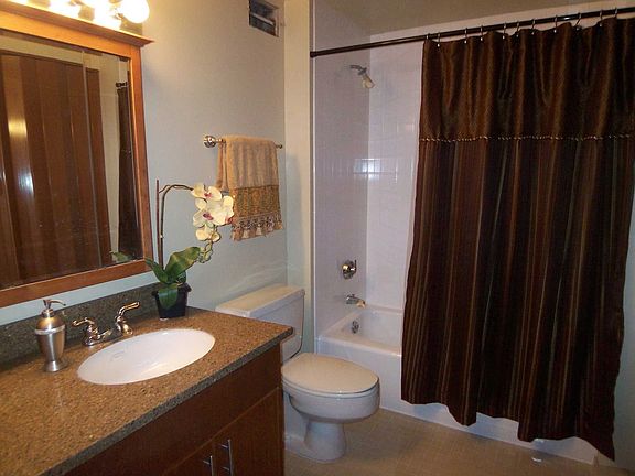 Two Refinished Bathrooms