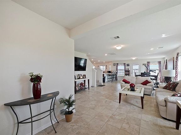 The large front entry leads into the living room/dining room combo. So much space to arrange however you like.