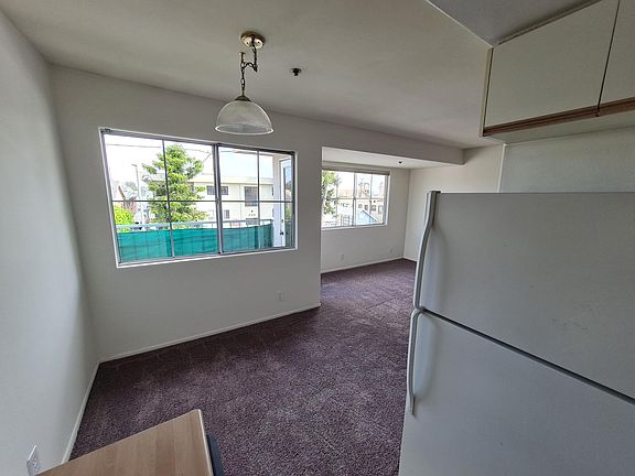 Living Space & Balcony from Kitchen