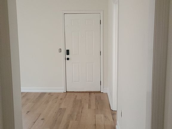 New flooring and paint - and the front door with electronic lock.