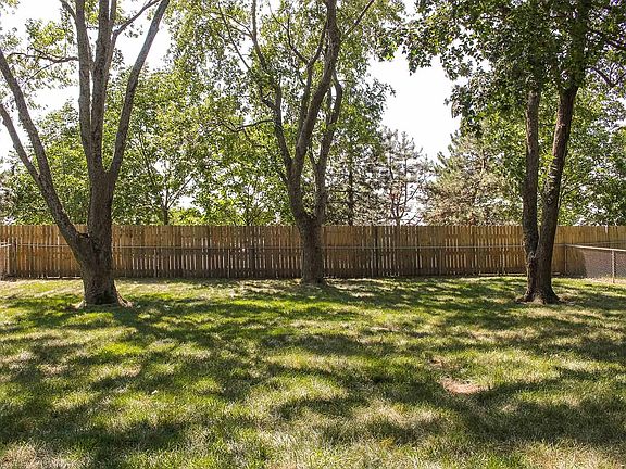 Fenced, Shaded Backyard