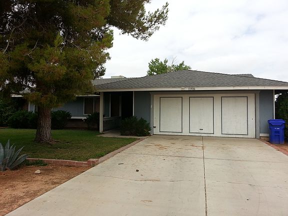 2 car attached garage with additional parking spaces