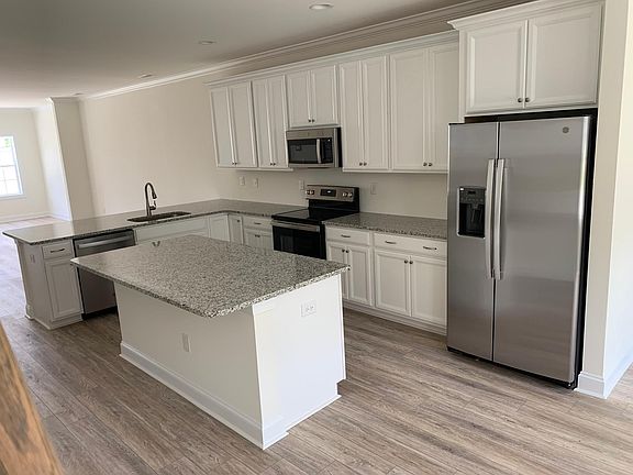 Kitchen with Granite Countertops and Stainless Steel Appliances