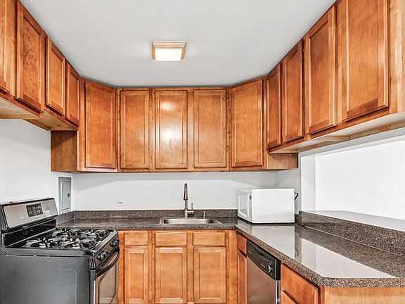 4th image of 4949 Church St APT 305