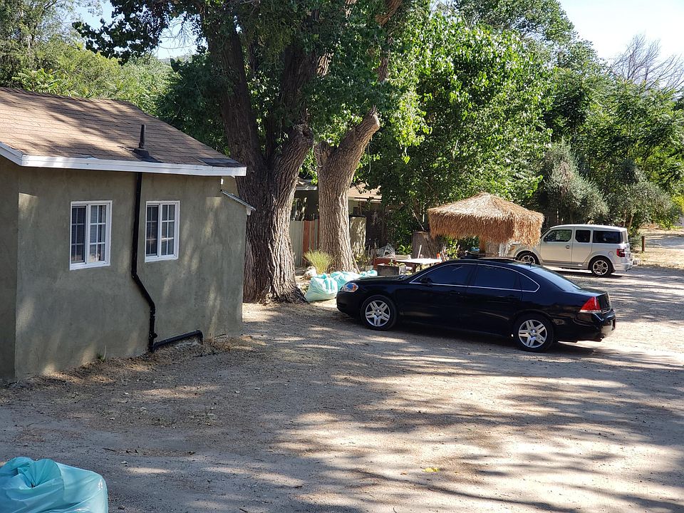 View of community, drive through, parking and common area.