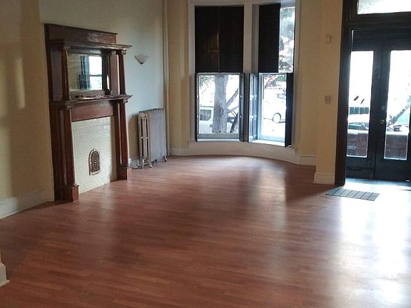 1st floor living room and front door view