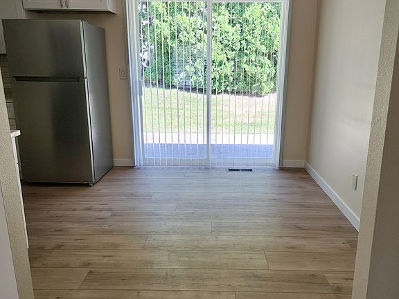 Dining/Nook area with patio access.