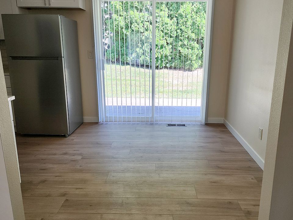 Dining/Nook area with patio access.