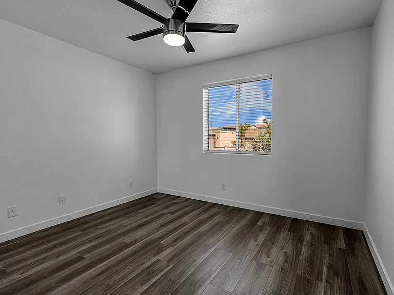 Bedroom 1, window facing front yard.